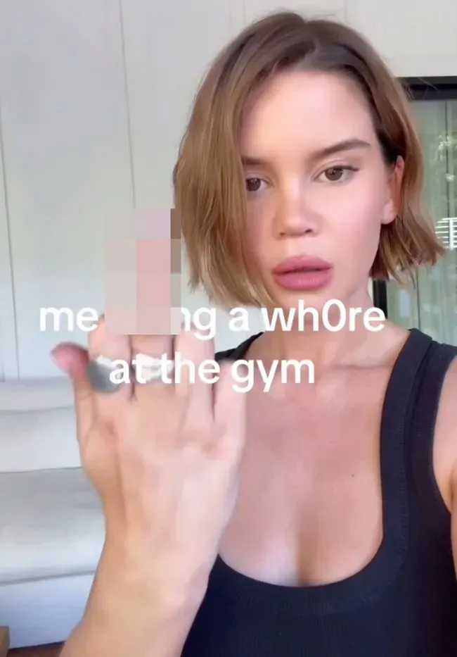 Maren Morris gives the middle finger to the camera with the text 