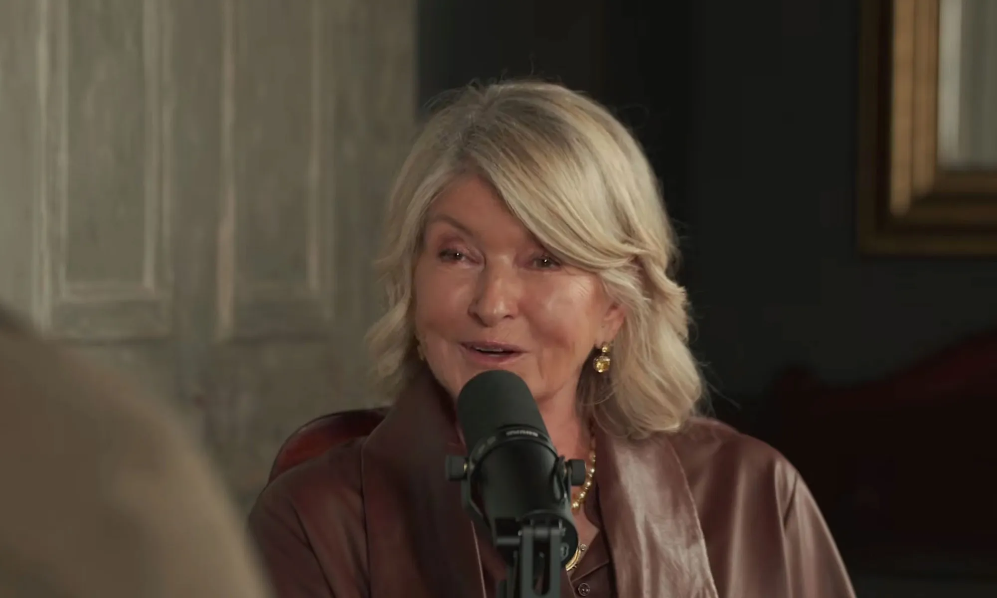 Martha Stewart speaking into a microphone.