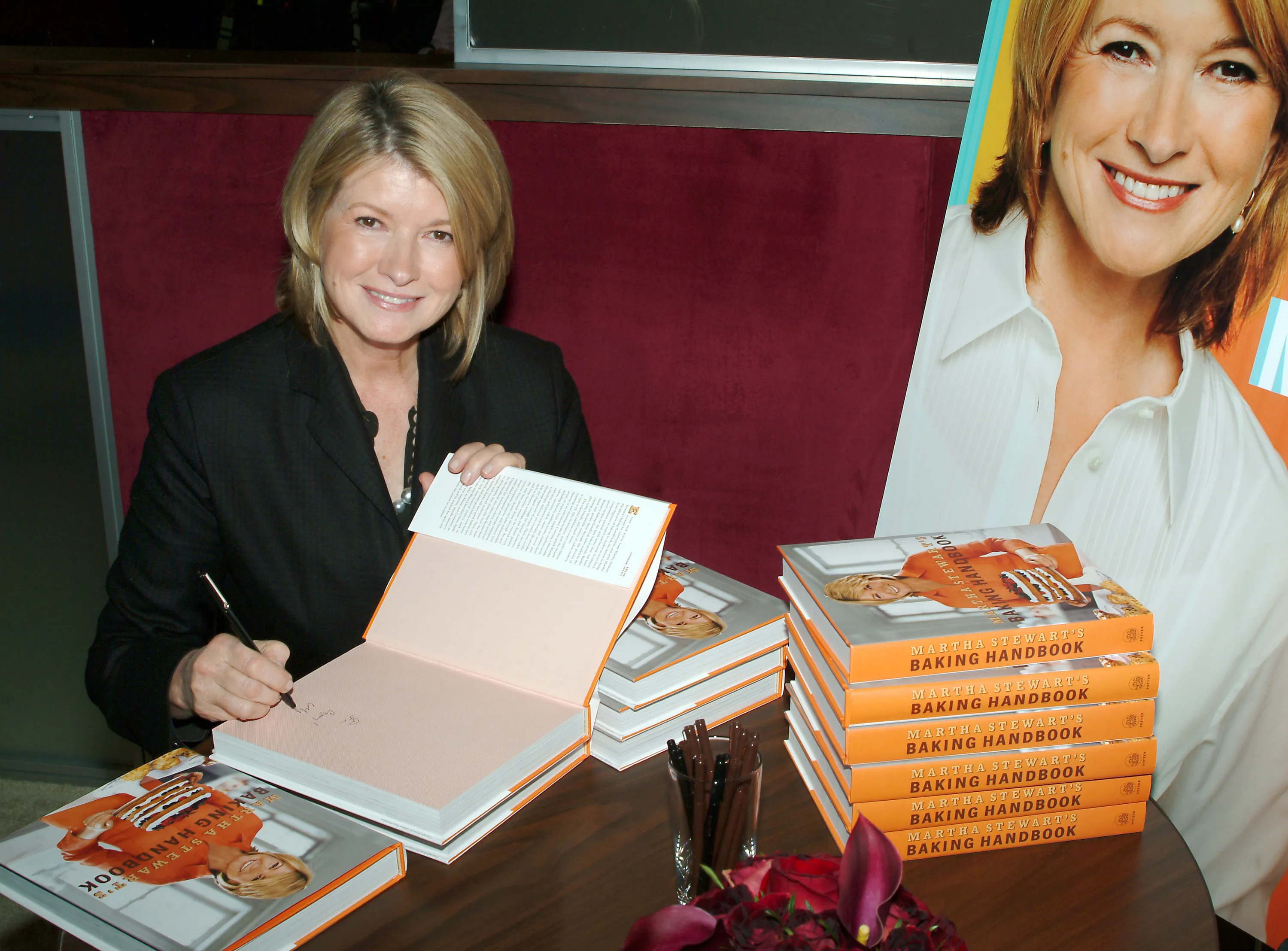 Martha Stewart signing copies of her book