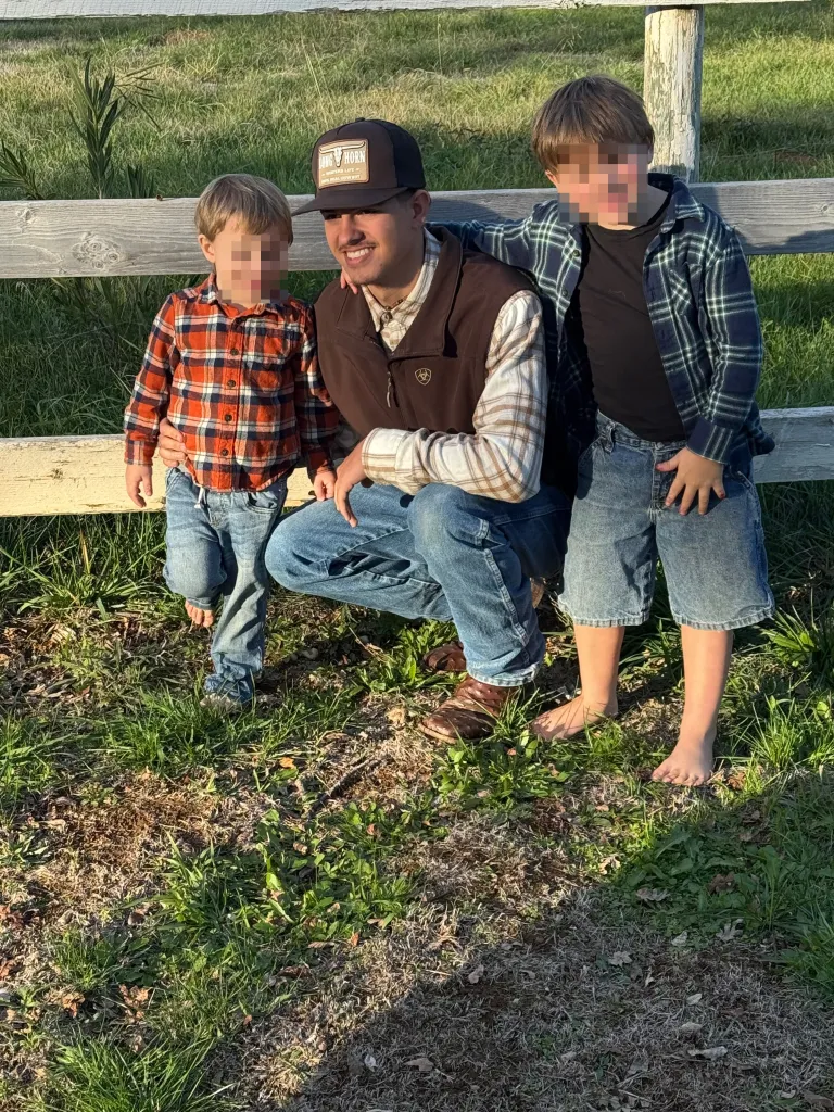 Martina and her three sons stand together after a devastating house fire.