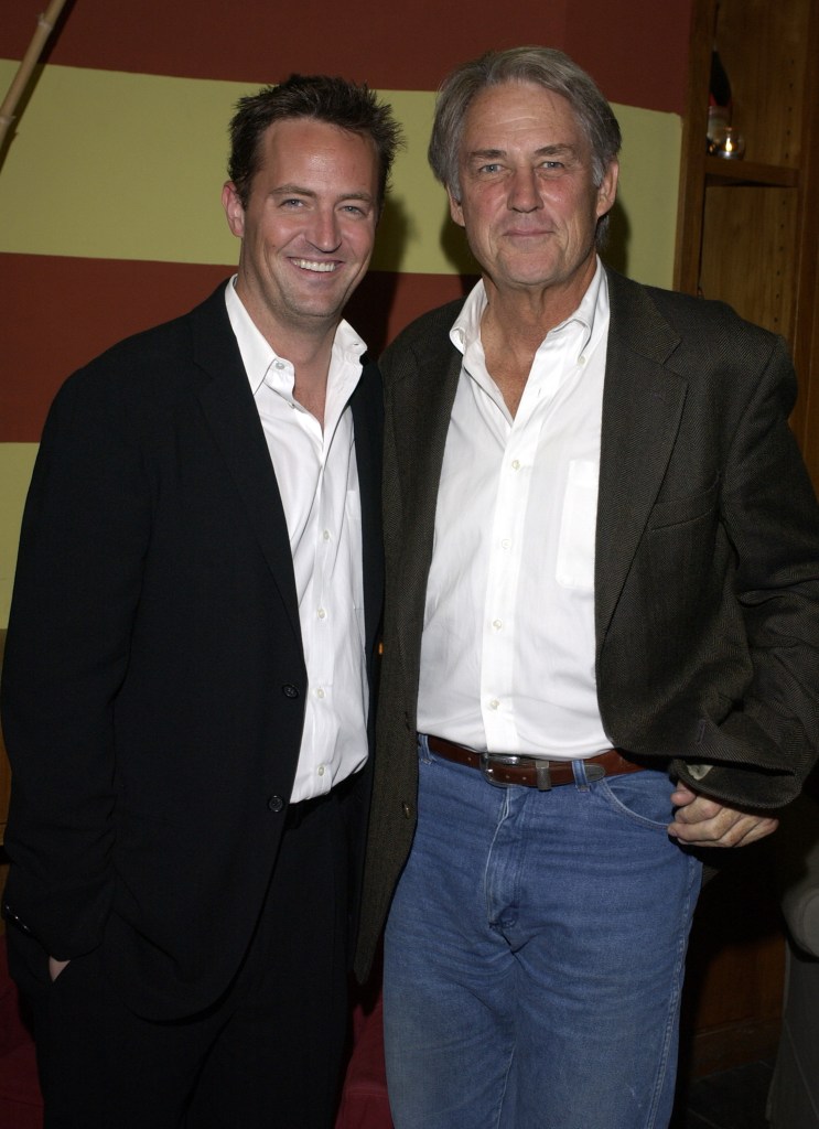 Matthew Perry and his father John Perry pose together.
