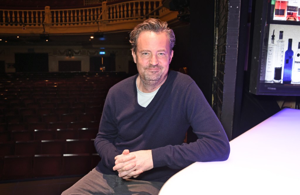 Matthew Perry poses at a photocall for his play 