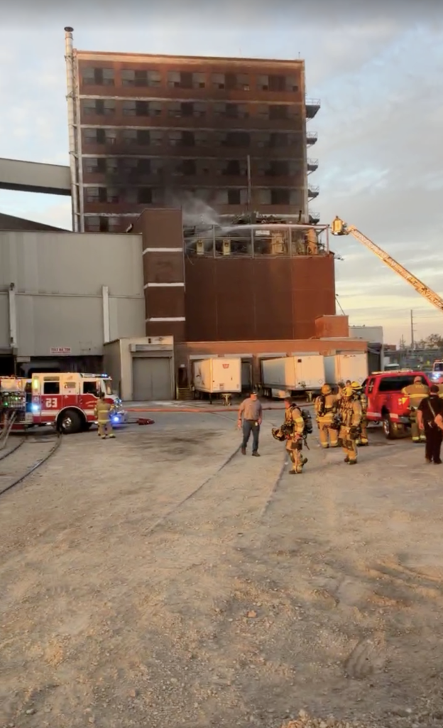Firefighters and emergency vehicles respond to a massive fire and explosion at the Quaker Oats plant.