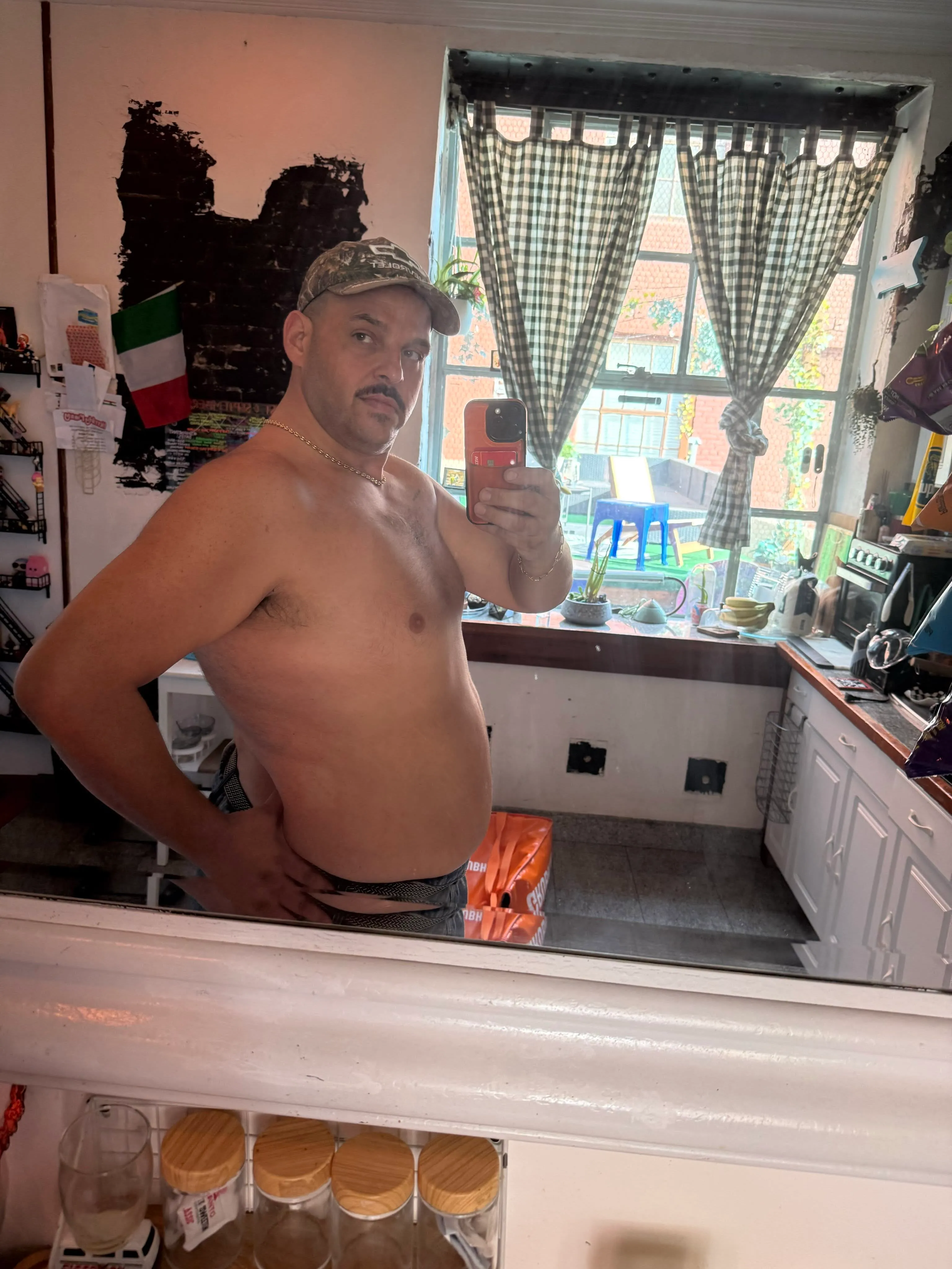 Actor Daniel Franzese takes a shirtless mirror selfie, showcasing his weight loss.