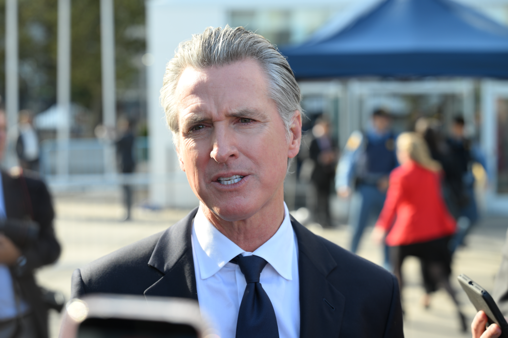 California Gov. Gavin Newsom speaks to reporters outside the United Nations Headquarters.