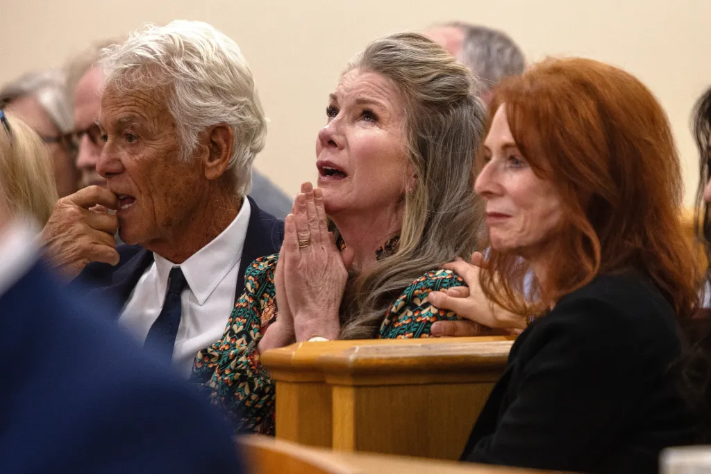 Melissa Gilbert reacts as her husband Timothy Busfield is granted a conditional release at a courtroom hearing.