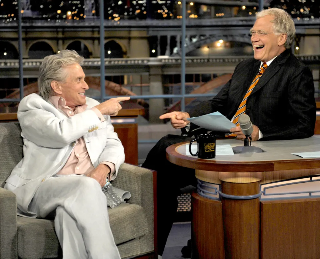 Michael Douglas gestures at David Letterman during an appearance on the Late Show.
