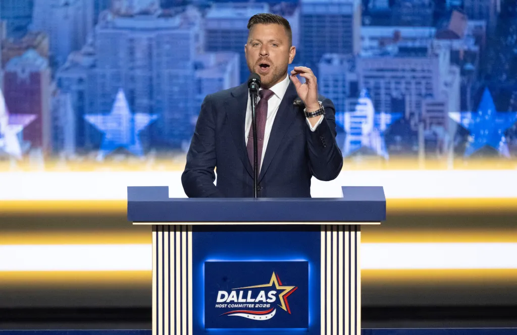 Mike LiPetri speaks at a podium during the Republican Midterm Convention.