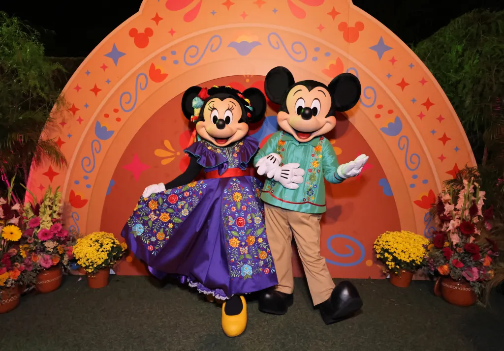Minnie Mouse and Mickey Mouse characters attend the Disney Somos Magic Creator Summit.