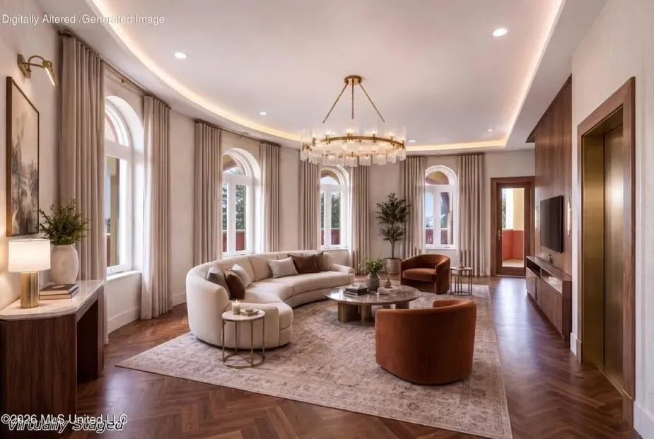 Virtually staged living room with a curved sofa, armchairs, and arched windows.