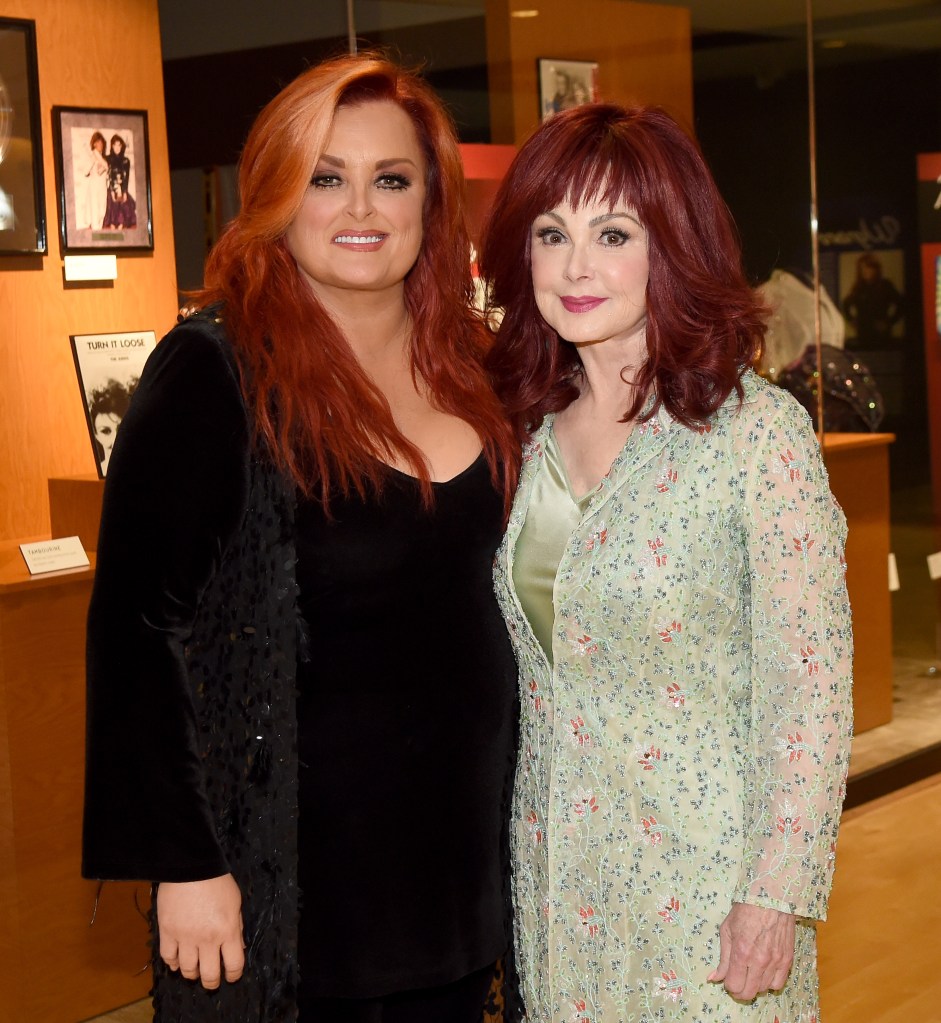 Wynonna Judd and Naomi Judd attend the exhibition debut, The Judds: Dream Chasers, at The Country Music Hall of Fame and Museum.