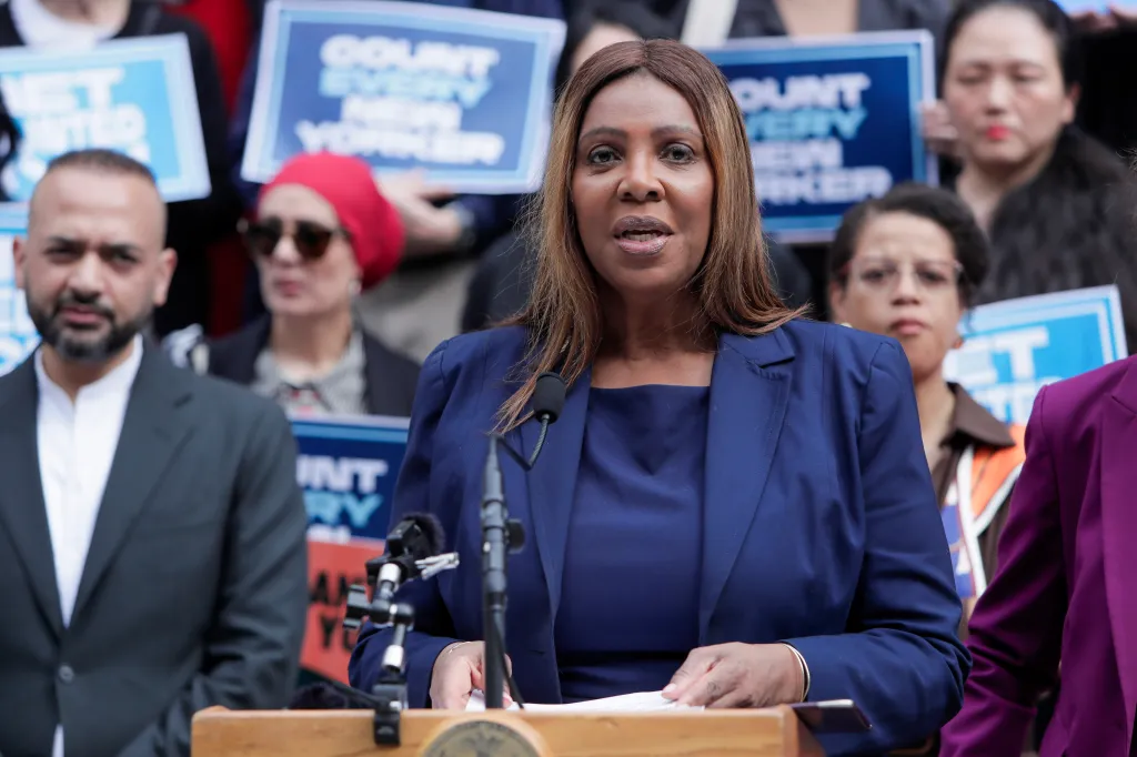 New York State Attorney General Letitia James speaks at a press conference on the steps of City Hall.