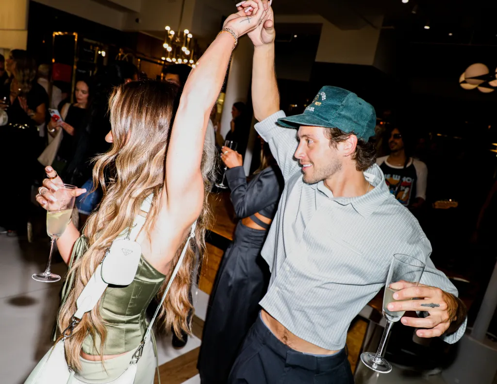 Arianna Biermann and Liam Obergfoll dance and hold hands at an event in New York City.