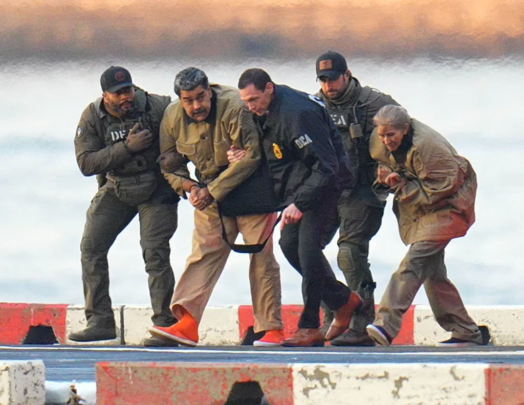 Nicolas Maduro and his wife, Cilia Flores, in handcuffs and escorted by heavily armed federal agents.