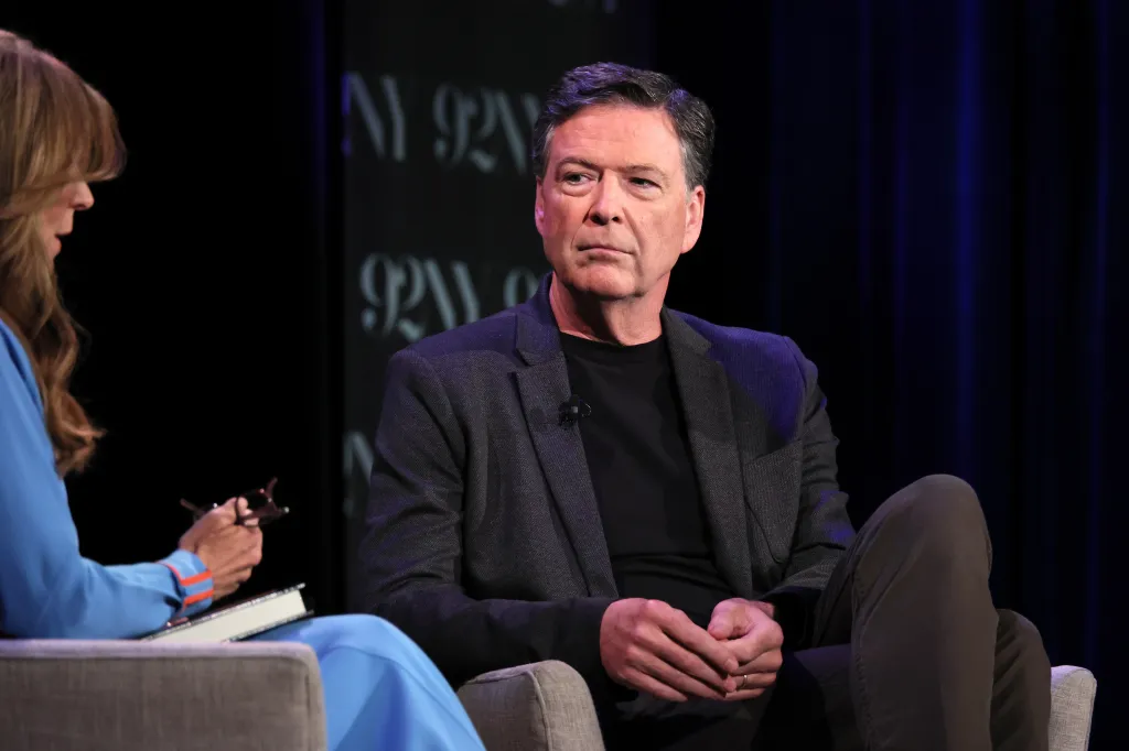 Nicolle Wallace interviews James Comey onstage.