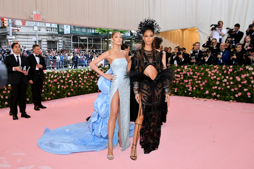 Candice Swanepoel and Joan Smalls on the pink carpet at the Met Gala.
