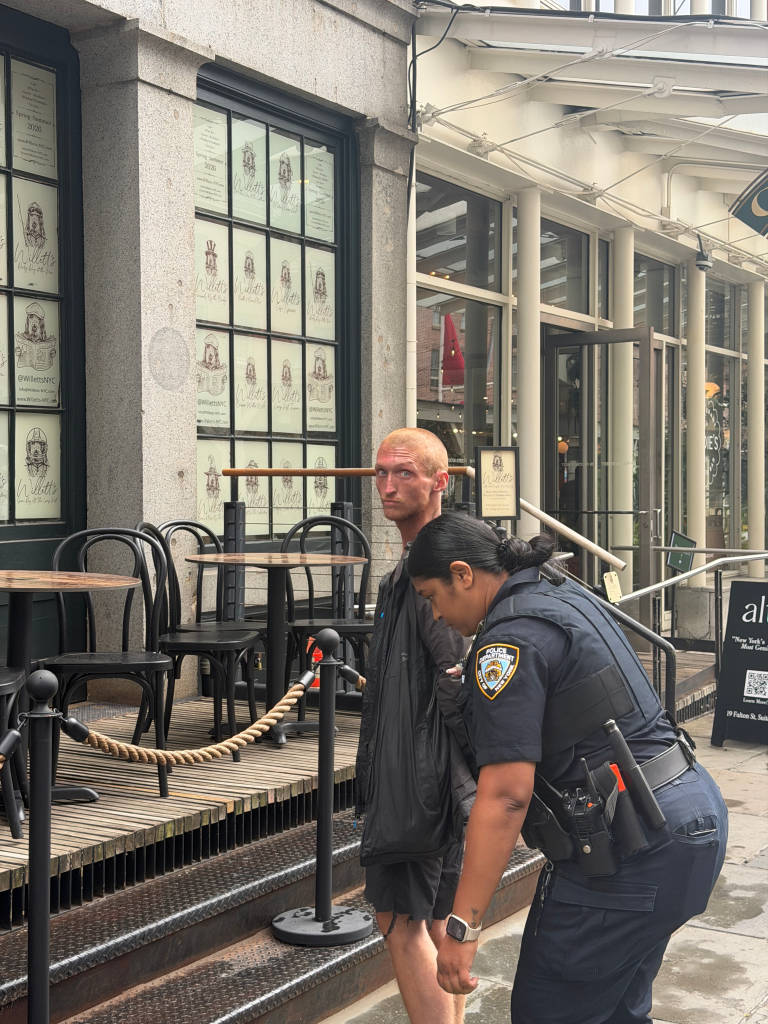 NYPD officers arrest Christopher Tarrant, 24.
