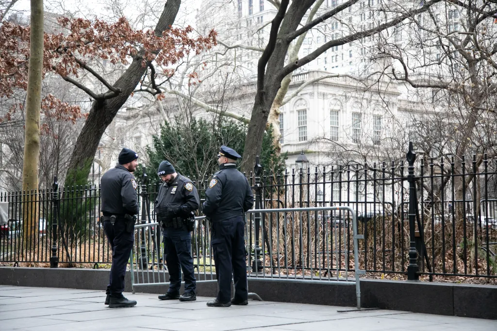 New York City Police Department officers patrol City Hall Park ahead of a planned Israel and Palestine protest.