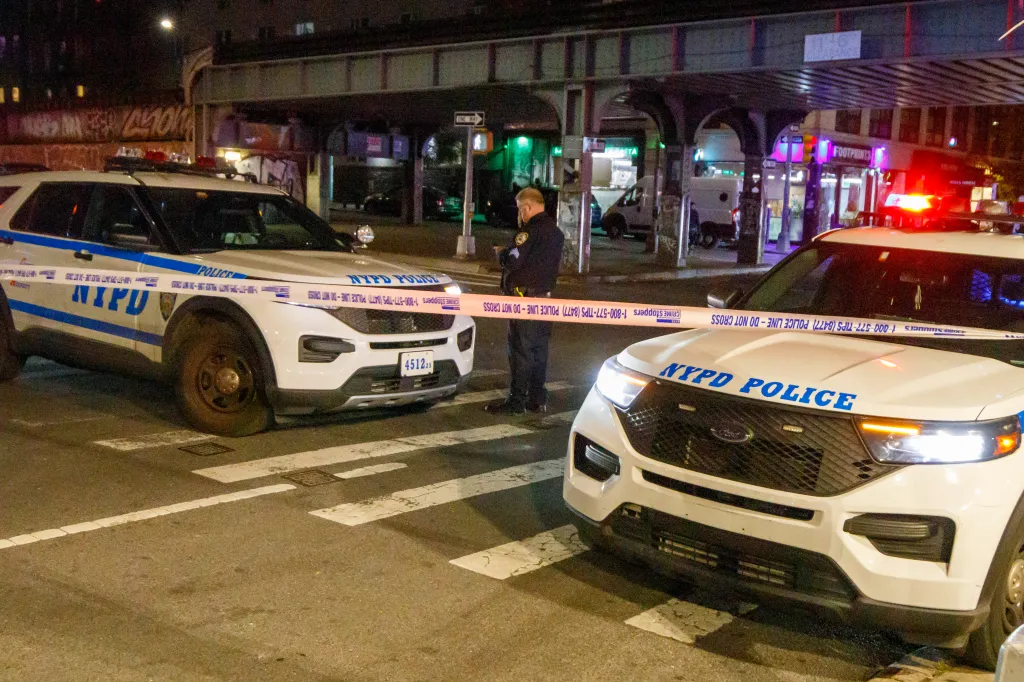 NYPD officers at the scene of an accident involving a car and an electric delivery bike on Nostrand Ave near Atlantic Ave in Brooklyn.