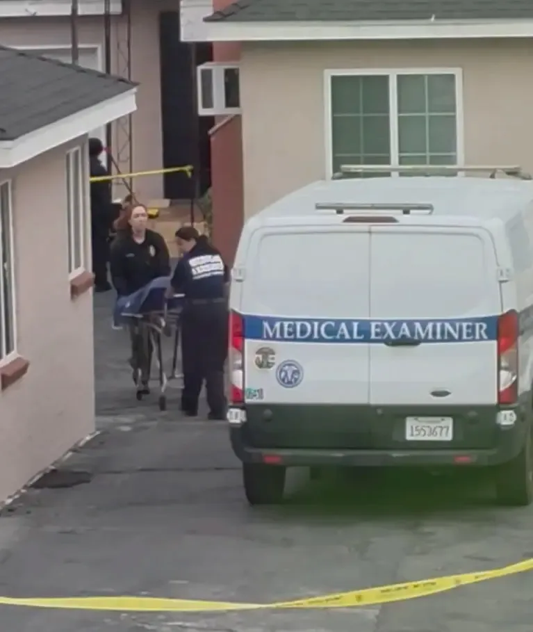 Officials remove Mayra Jimenez's body from her apartment in North Hollywood.