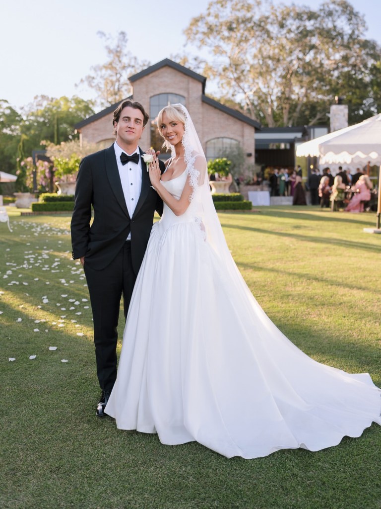 OnlyFans star Annie Knight and Henry Brayshaw pose during their wedding ceremony.