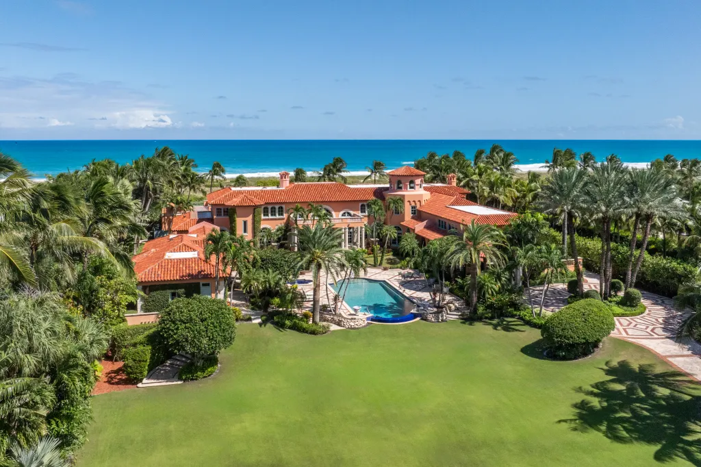 The Goodman estate in Palm Beach spans more than two acres, with 250 feet of direct ocean frontage.