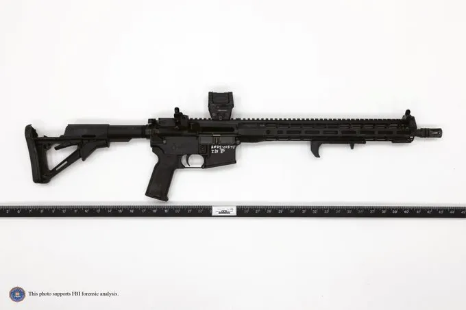A Panther Arms semiautomatic rifle used by Thomas Crooks against former U.S. President Donald Trump, shown assembled above a ruler in an FBI evidence photo.