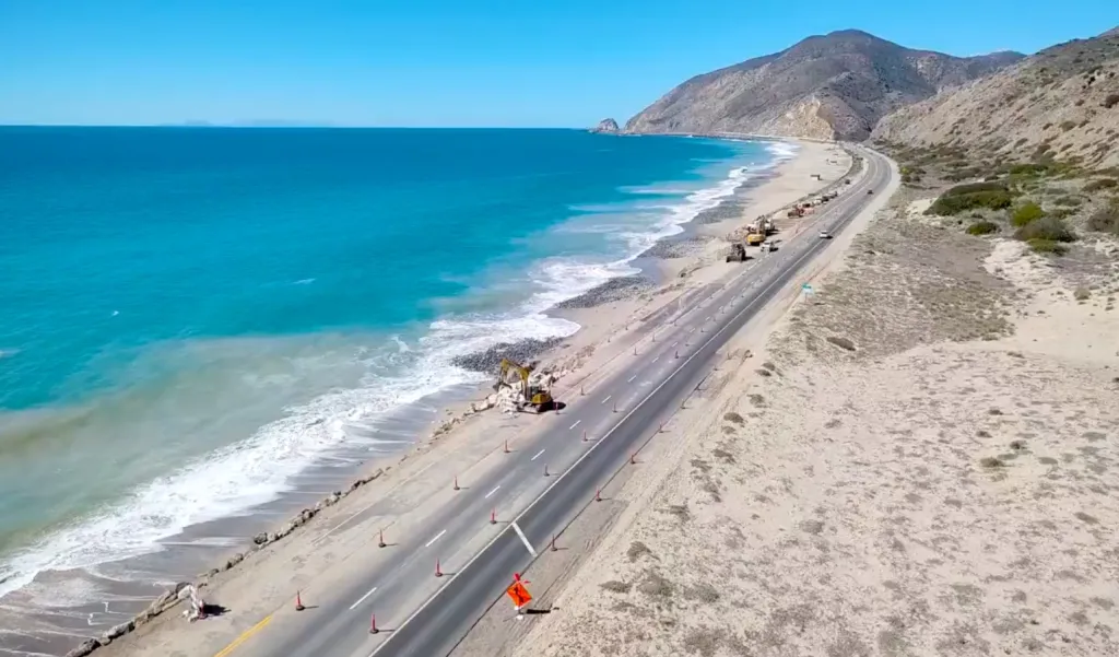 Crews construct Rock Slope Protection along State Route 1 at Thornhill Broome Beach.