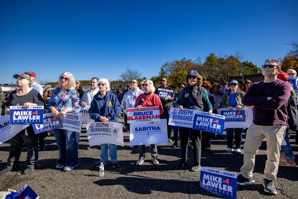 People attend a Republican Get Out The Vote Rally.