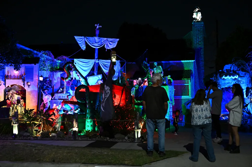 People visit a Halloween-decorated house called Pirates of Burbank.