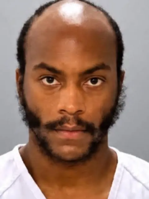 Mugshot of Eric Lewis.