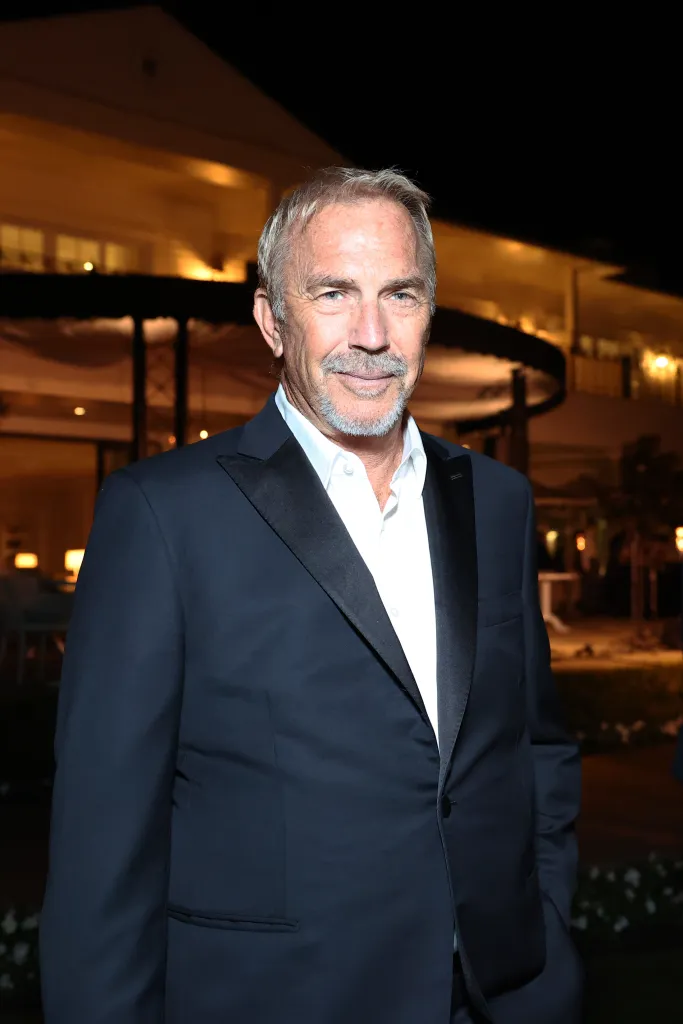 Kevin Costner in a tuxedo at an evening event.