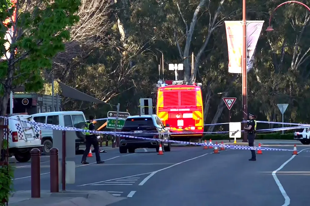 Police officers at the scene where Australian independent lawmaker Helen Haines was struck by a car in Wangaratta.