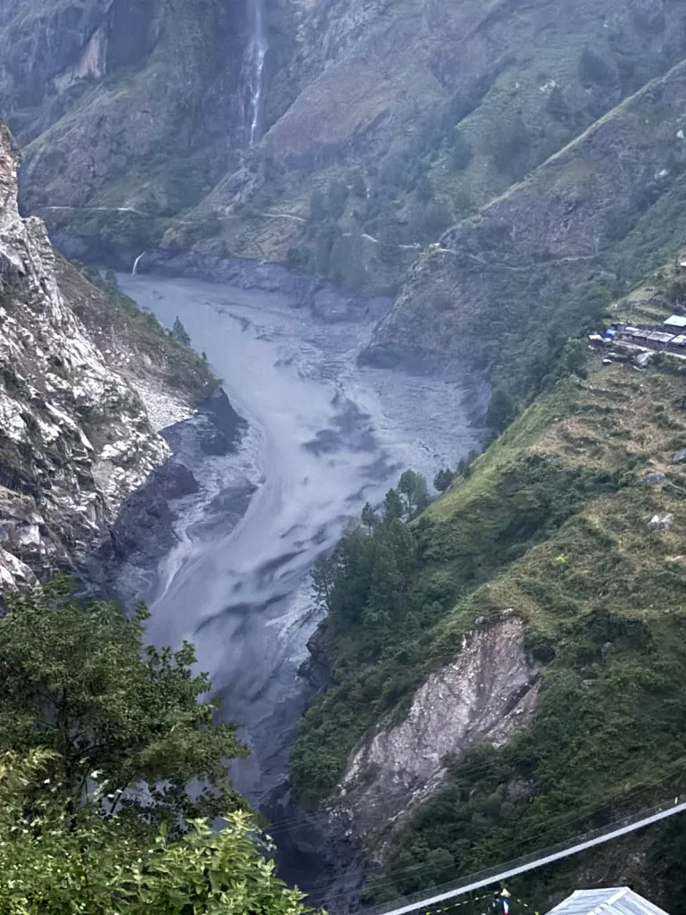 An aerial view shows the Budhi Gandaki River swollen by flash floods in Gorkha district, Nepal, Sunday, Oct. 11, 2026.