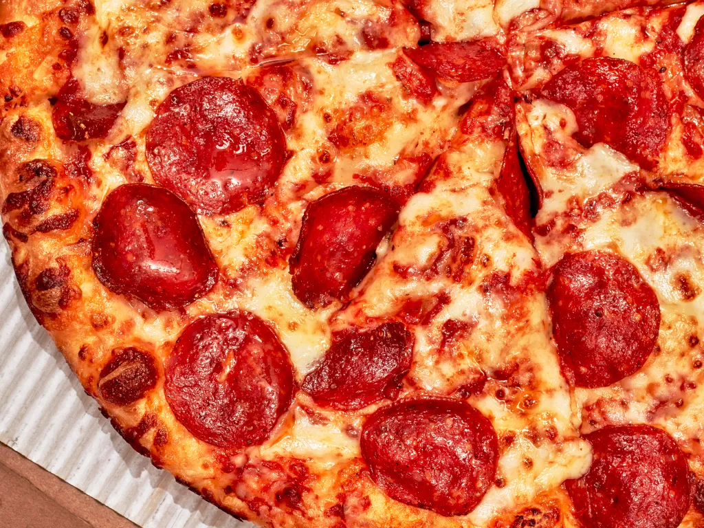 A pizza pie.
