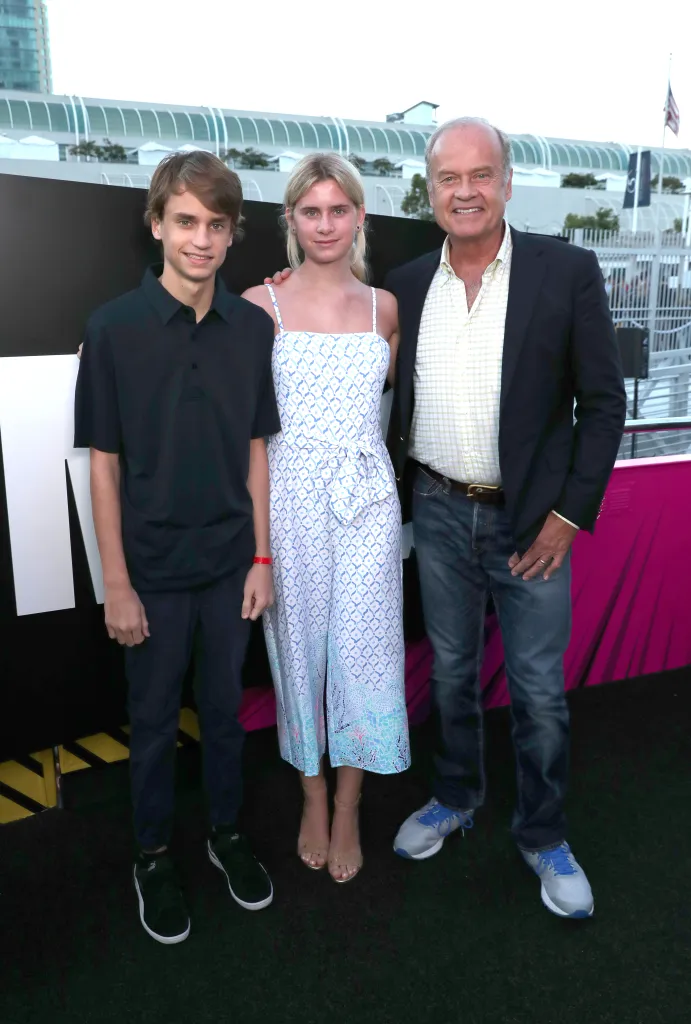 Jude Gordon Grammer, Mason Olivia Grammer, and Kelsey Grammer pose together outdoors.
