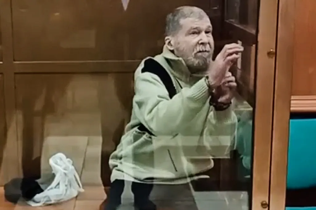 Stephen Hubbard stands in a glass cage during a court session in the Moscow City court in Moscow, Russia on Oct. 7, 2024.