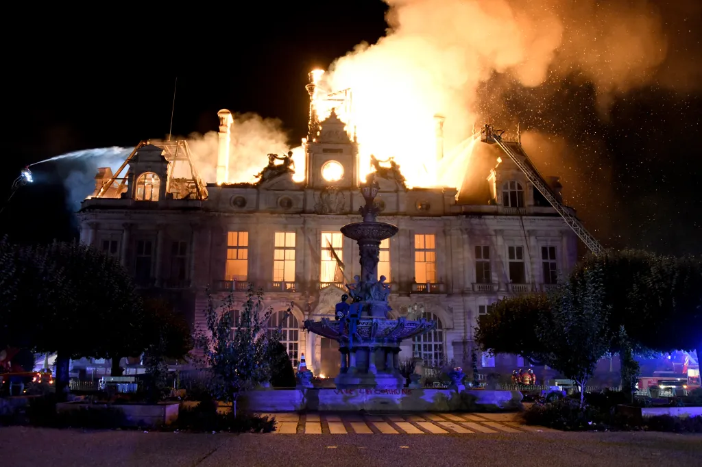 A fire burns and destroys the city hall in Limoges, central France, during a protest against the high cost of living.