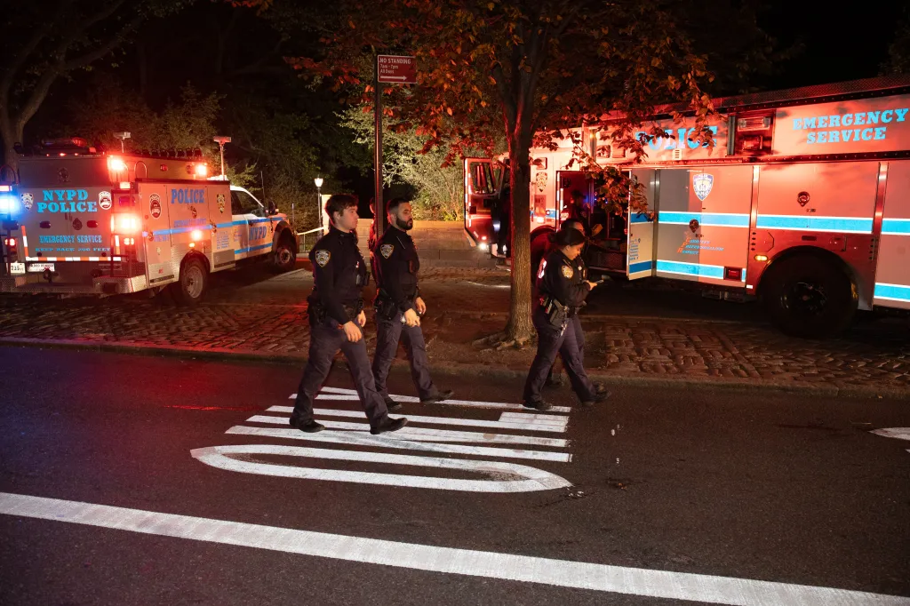 Police officers at the scene of an assault in Central Park.