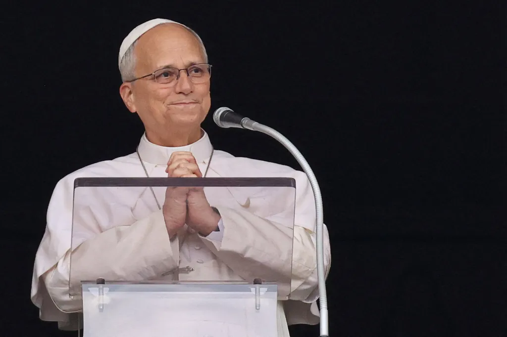 Pope Leo leads the Sunday Angelus prayer from a window of the Apostolic Palace.