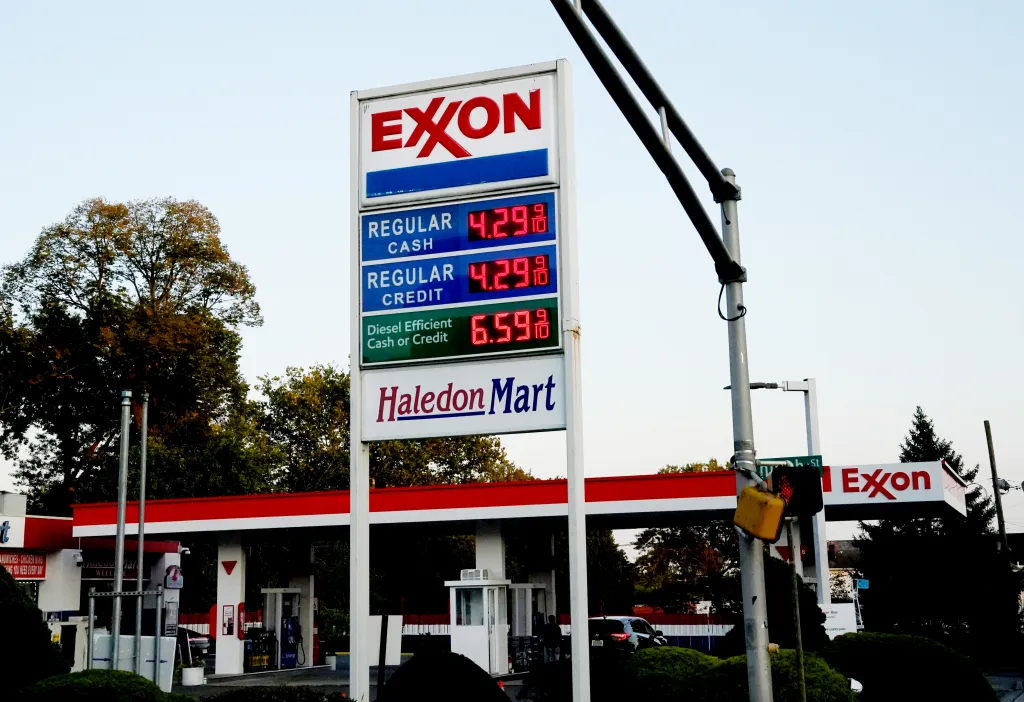 An Exxon gas station sign displays prices of $4.29 for regular cash and credit, and $6.59 for diesel.