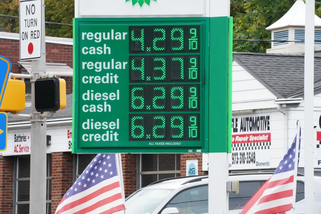 A BP gas station sign displays prices for regular cash ($4.29 9/10), regular credit ($4.37 9/10), diesel cash ($6.29 9/10), and diesel credit ($6.29 9/10).
