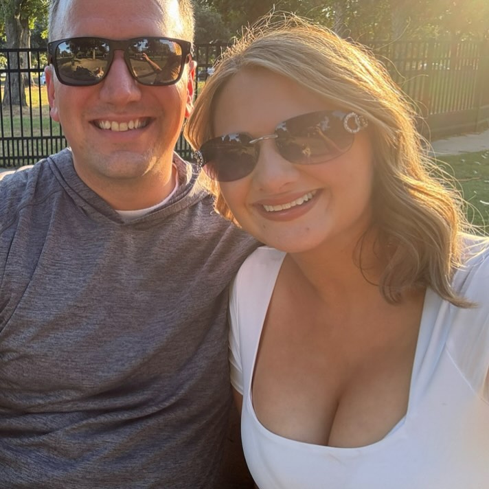 Gypsy-Rose Blanchard and Ken Urker smiling together outdoors, both wearing sunglasses.