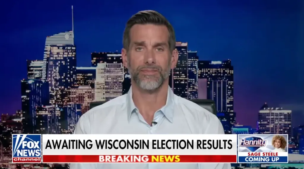 Jason Galanis speaking in front of a city skyline backdrop on Fox News.