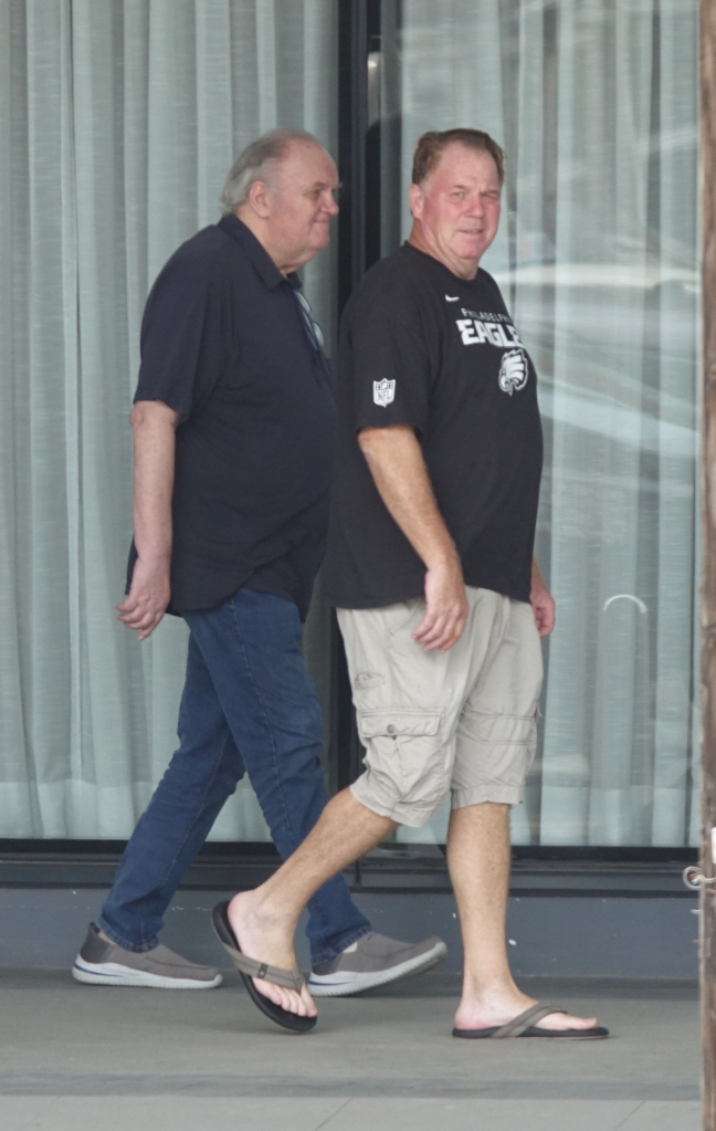 Thomas Markle and his son Thomas Markle Jr. walking outside in the Philippines.