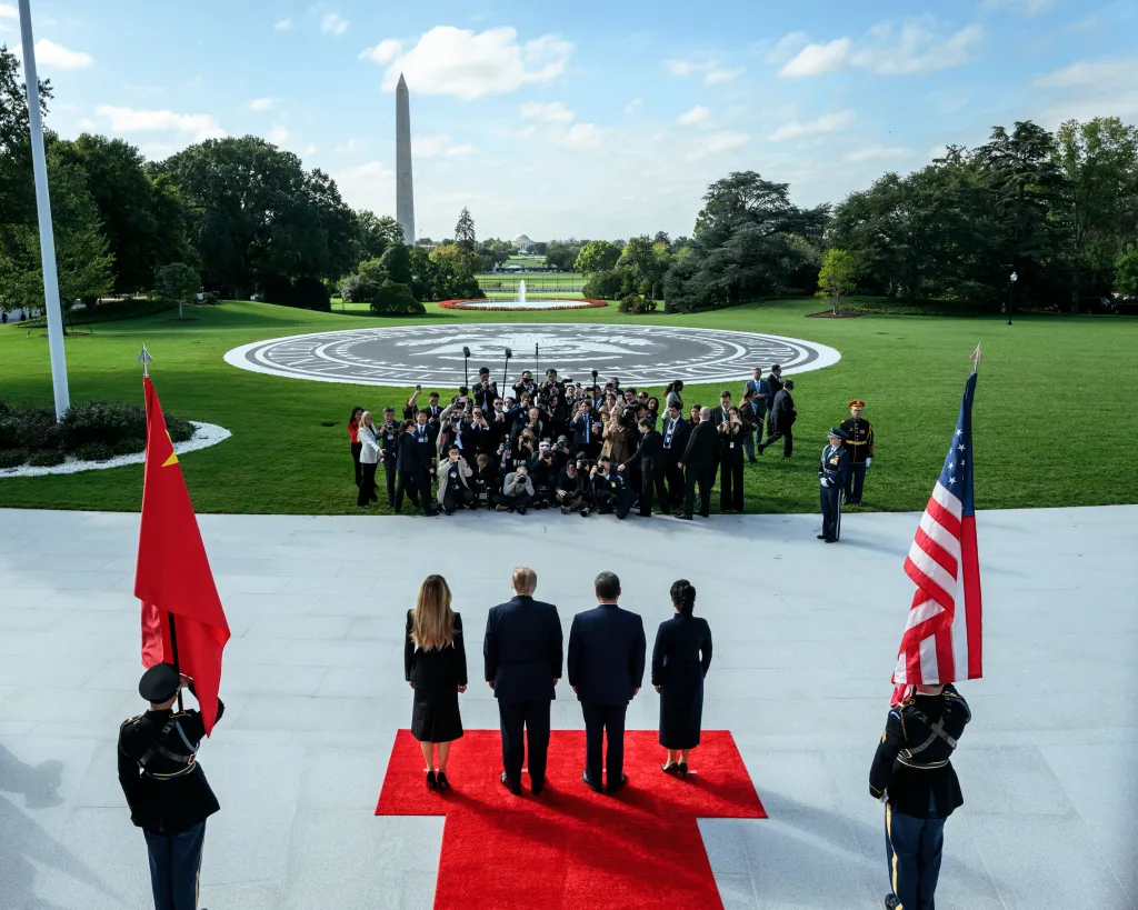 President Donald J. Trump and First Lady Melania Trump greet President Xi Jinping of China and First Lady Peng Liyuan at the South Portico during a State Arrival ceremony.