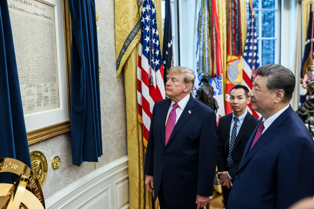 President Donald J. Trump and President Xi Jinping of China view a document in the Oval Office.