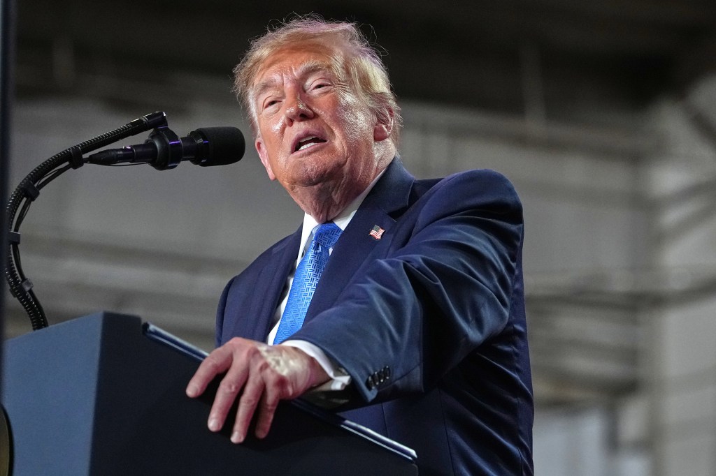 President Donald Trump speaks at a campaign rally at Crossroads Arena in Corinth, Miss.