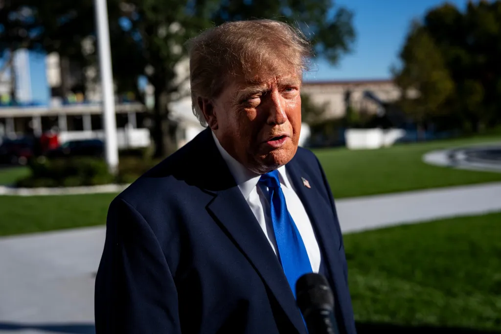 President Donald Trump speaks to the press on the South Lawn of the White House.