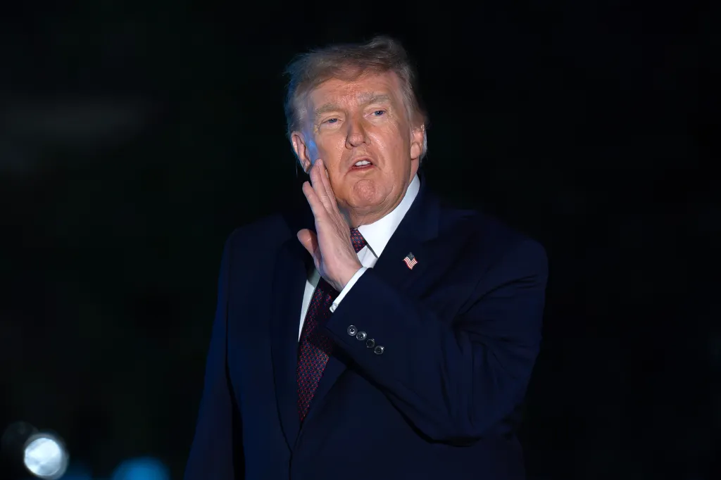 President Donald Trump speaks to reporters at the White House.